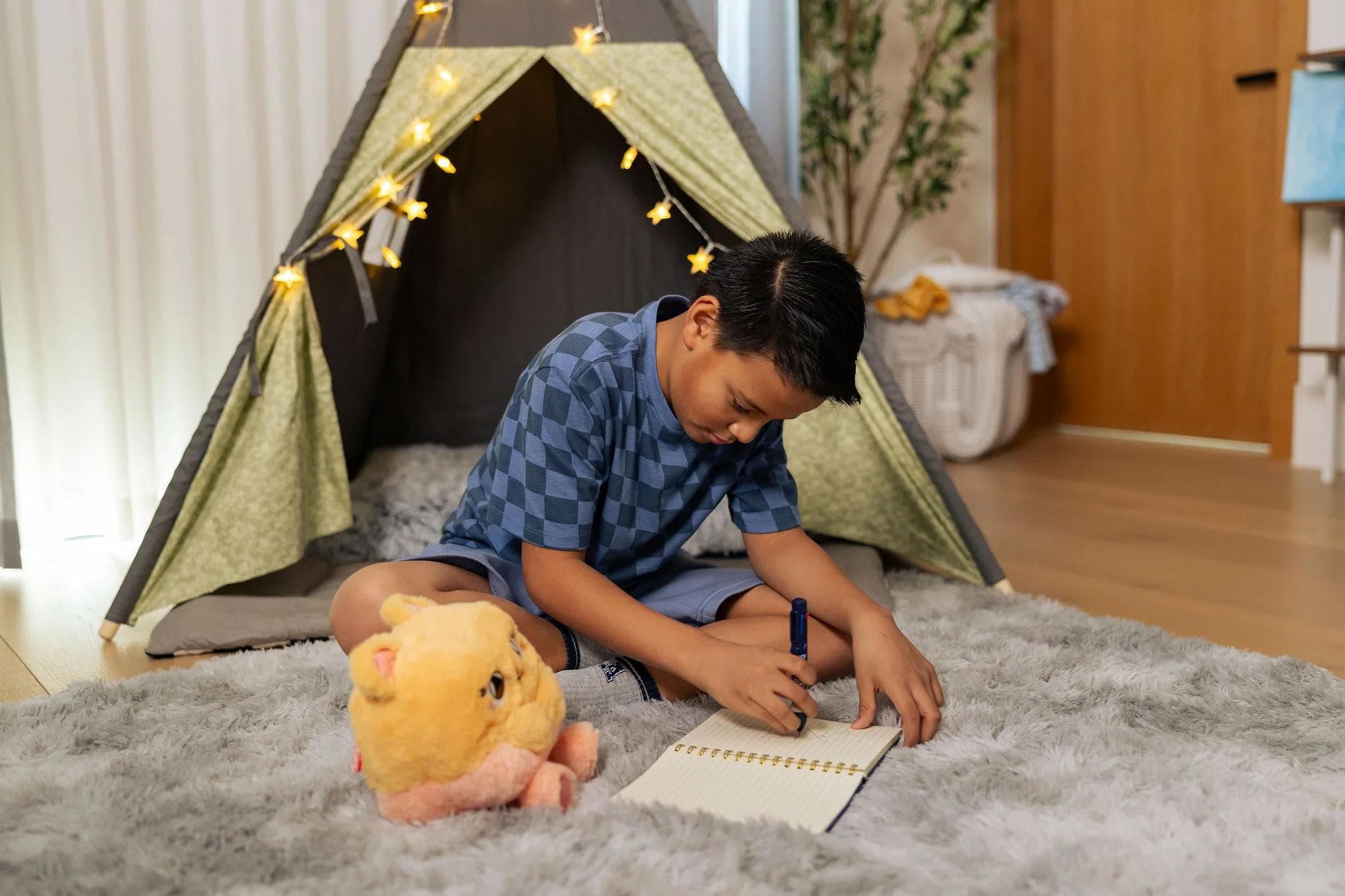 Poppy studying with young boy