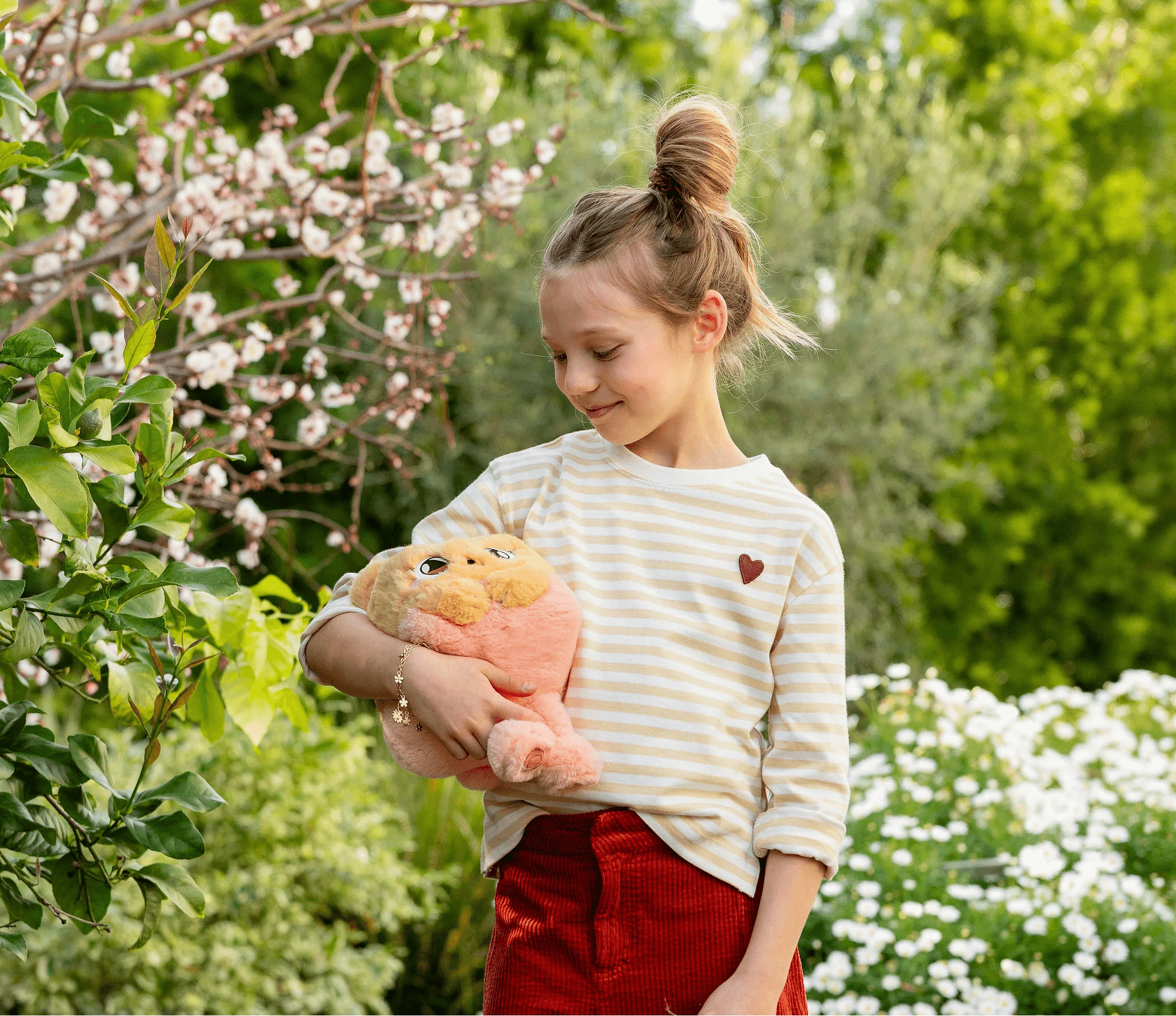 Girl holding Curio AI Toy Poppy