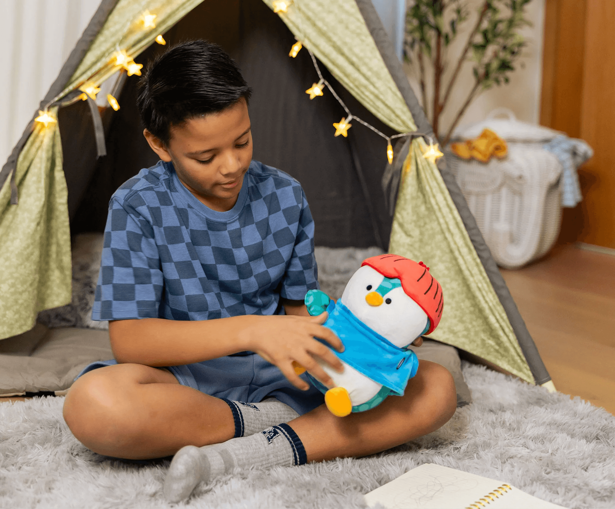 Boy being told story by Springer Curio Toy