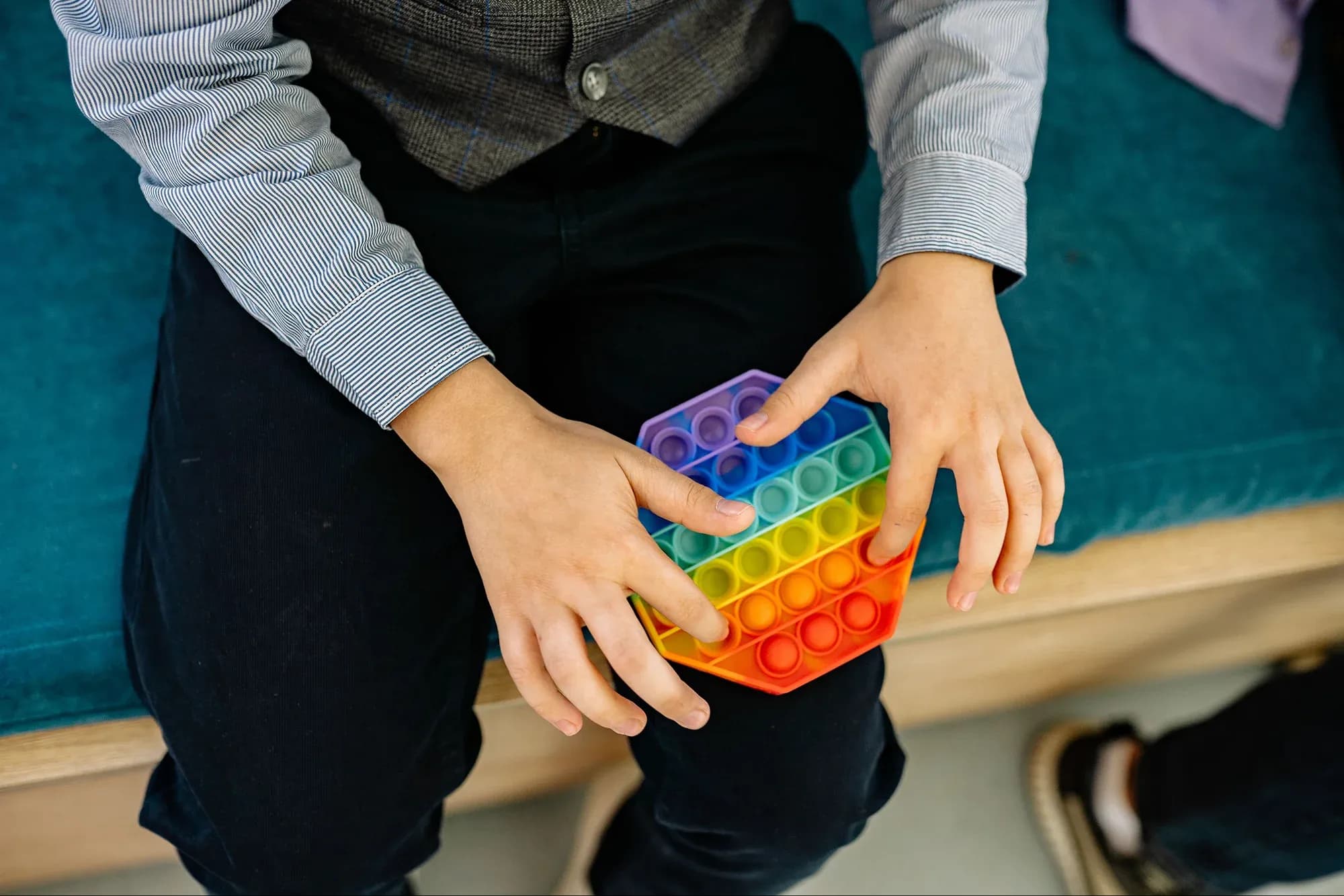 Child playing with sensory toy