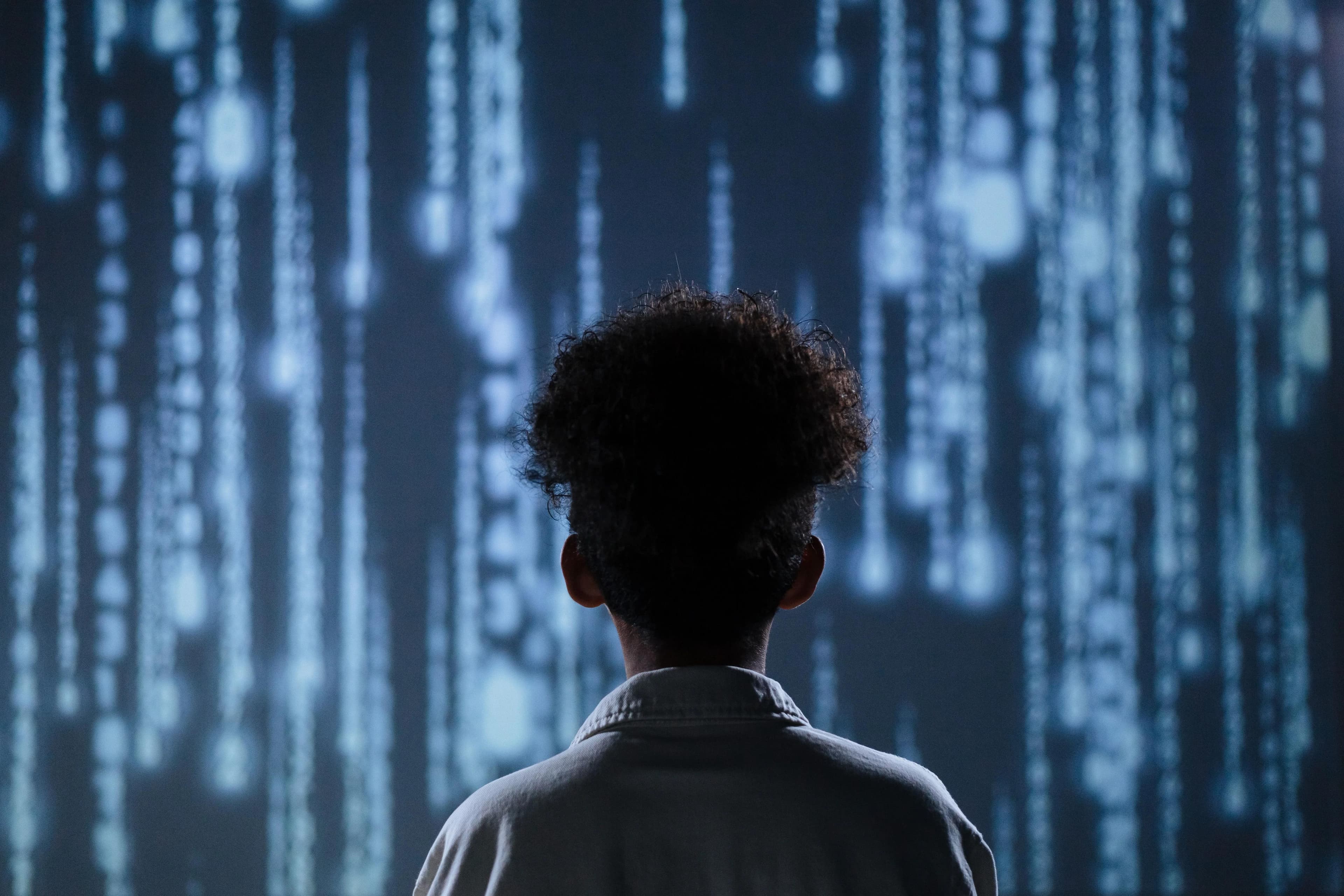 Child in front of data stream